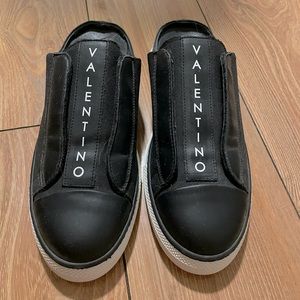 Valentino black and white slip ons